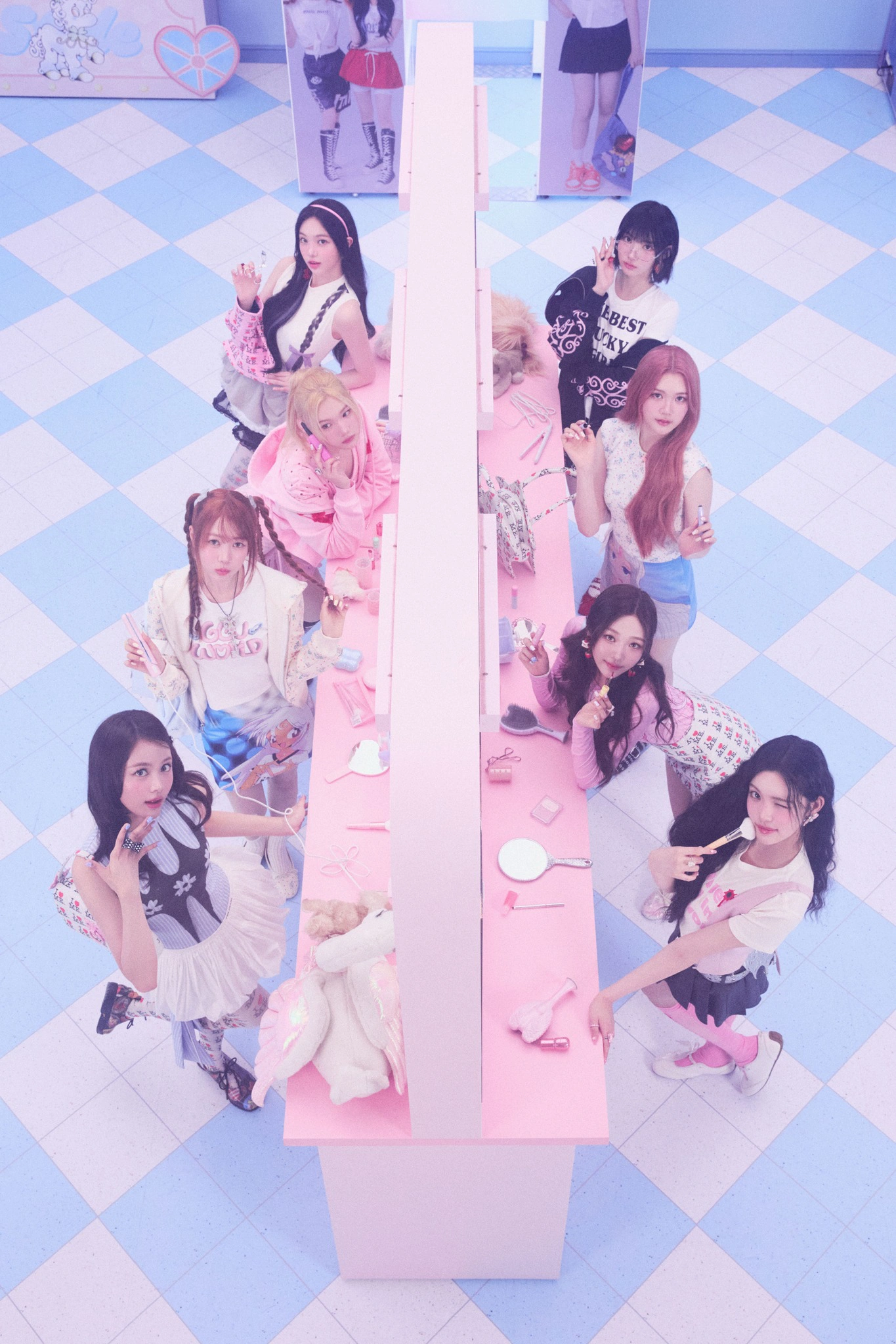 Hearts2Hearts group concept photo for Style, members at a pink vanity room seen from above